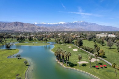 Upon entering this beautifully two-bedroom, two-bath condo on Desert Island Golf and Country Club in California - for sale on GolfHomes.com, golf home, golf lot