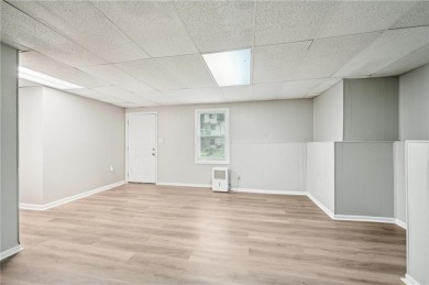 Welcome to this beautiful brick front home nestled on a sweeping on Hidden Hills Country Club in Georgia - for sale on GolfHomes.com, golf home, golf lot