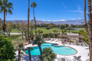 Upon entering this beautifully two-bedroom, two-bath condo on Desert Island Golf and Country Club in California - for sale on GolfHomes.com, golf home, golf lot