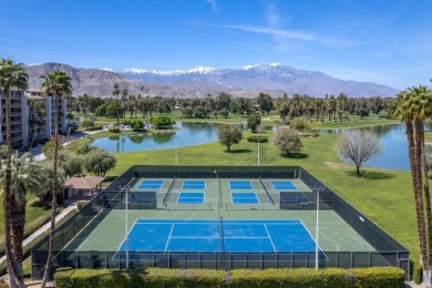 Upon entering this beautifully two-bedroom, two-bath condo on Desert Island Golf and Country Club in California - for sale on GolfHomes.com, golf home, golf lot