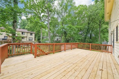 Welcome to this beautiful brick front home nestled on a sweeping on Hidden Hills Country Club in Georgia - for sale on GolfHomes.com, golf home, golf lot