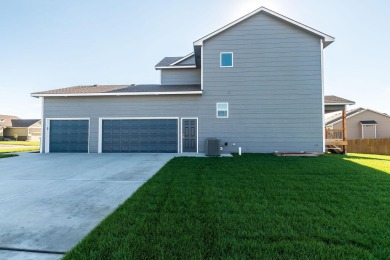 This gorgeous 2-story 3 car side load garage home is sure to on Tex Consolver Golf Course in Kansas - for sale on GolfHomes.com, golf home, golf lot
