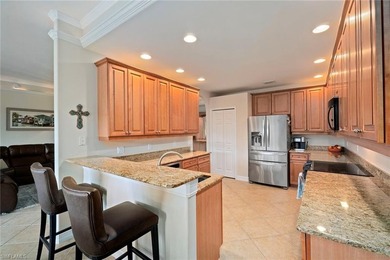Panoramic golf course and sparkling water views stretch on  in Florida - for sale on GolfHomes.com, golf home, golf lot