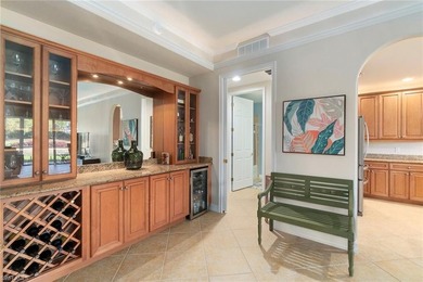 Panoramic golf course and sparkling water views stretch on  in Florida - for sale on GolfHomes.com, golf home, golf lot