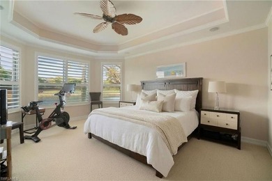 Panoramic golf course and sparkling water views stretch on  in Florida - for sale on GolfHomes.com, golf home, golf lot