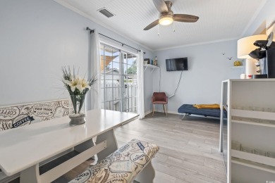 Discover this beautifully updated 2-bedroom, 1.5-bath townhome on Myrtlewood Golf Course and Club  in South Carolina - for sale on GolfHomes.com, golf home, golf lot