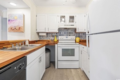 Discover this beautifully updated 2-bedroom, 1.5-bath townhome on Myrtlewood Golf Course and Club  in South Carolina - for sale on GolfHomes.com, golf home, golf lot