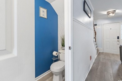 Discover this beautifully updated 2-bedroom, 1.5-bath townhome on Myrtlewood Golf Course and Club  in South Carolina - for sale on GolfHomes.com, golf home, golf lot