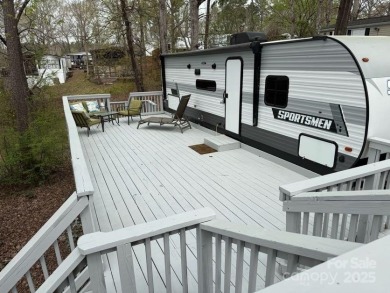 Badin Shores Resort is a private, gated community that includes on Old North State Club at Uwharrie Point Golf community in North Carolina - for sale on GolfHomes.com, golf home, golf lot