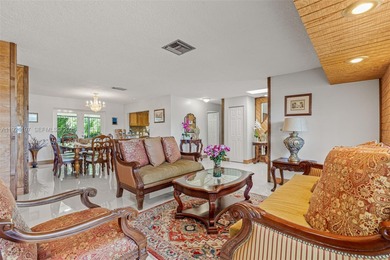 Welcome to this beautifully maintained single-family home in the on Calusa Country Club in Florida - for sale on GolfHomes.com, golf home, golf lot