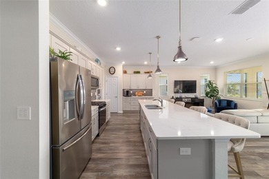 Move-in ready and like new, this 2023 Ginger model Smart Home on Candler Hills Golf and Country Club in Florida - for sale on GolfHomes.com, golf home, golf lot
