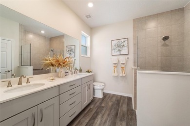 Move-in ready and like new, this 2023 Ginger model Smart Home on Candler Hills Golf and Country Club in Florida - for sale on GolfHomes.com, golf home, golf lot