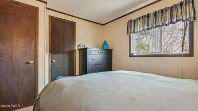 This isn't a getaway. It's a ''get-here-now!'' Move-in ready on Thornhurst Country Club in Pennsylvania - for sale on GolfHomes.com, golf home, golf lot