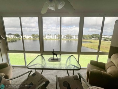 HIGHLY DESIRABLE BUILDING LOCATED NEAR THE CLUBHOUSE, PLAZA AND on Hillsboro Pines Golf in Florida - for sale on GolfHomes.com, golf home, golf lot