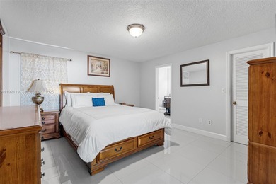 Welcome to this beautifully maintained single-family home in the on Calusa Country Club in Florida - for sale on GolfHomes.com, golf home, golf lot