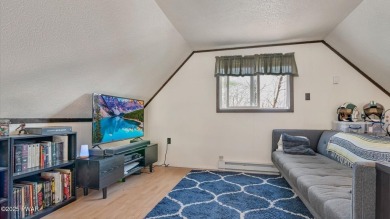 This isn't a getaway. It's a ''get-here-now!'' Move-in ready on Thornhurst Country Club in Pennsylvania - for sale on GolfHomes.com, golf home, golf lot
