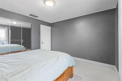 Welcome to this beautifully maintained single-family home in the on Calusa Country Club in Florida - for sale on GolfHomes.com, golf home, golf lot