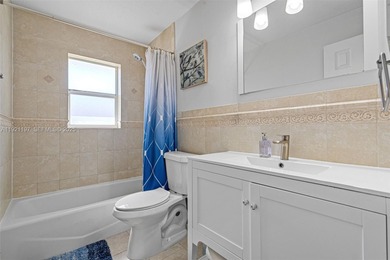 Welcome to this beautifully maintained single-family home in the on Calusa Country Club in Florida - for sale on GolfHomes.com, golf home, golf lot