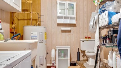 This isn't a getaway. It's a ''get-here-now!'' Move-in ready on Thornhurst Country Club in Pennsylvania - for sale on GolfHomes.com, golf home, golf lot