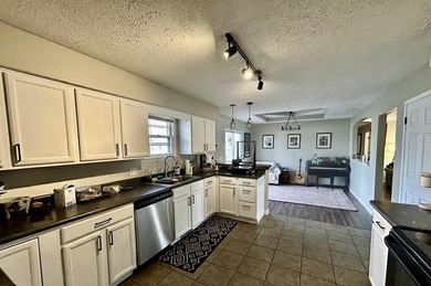 Nestled in a warm neighborhood just north of I-44 and Glenstone on Bill and Payne Stewart Golf Course  in Missouri - for sale on GolfHomes.com, golf home, golf lot