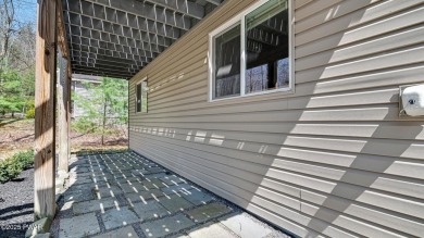 This isn't a getaway. It's a ''get-here-now!'' Move-in ready on Thornhurst Country Club in Pennsylvania - for sale on GolfHomes.com, golf home, golf lot