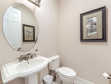 Whether scaling down from a larger custom home or moving-up from on Shadow Wood Country Club in Florida - for sale on GolfHomes.com, golf home, golf lot