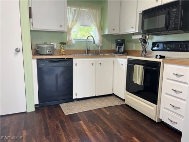 BEAUTIFUL HOME in Phase 3 of the much Desired Tamiami Villagee & on Six Lakes Country Club in Florida - for sale on GolfHomes.com, golf home, golf lot