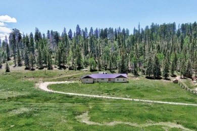 Conveniently located halfway between Taos and Angel Fire, along on El Valle Escondido Golf Course in New Mexico - for sale on GolfHomes.com, golf home, golf lot