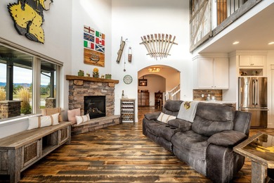 Beautifully upgraded and move-in ready, this two-level paired on The Powder Horn Golf Club - Mountain in Wyoming - for sale on GolfHomes.com, golf home, golf lot