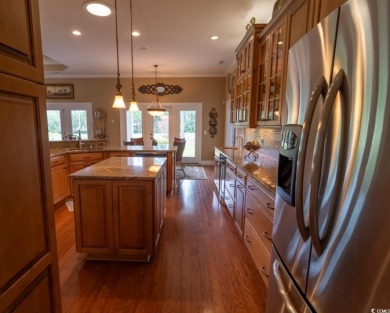 Welcome to 909 Heshbon Drive in Tidewater Plantation--a on Tidewater Golf Club and Plantation in South Carolina - for sale on GolfHomes.com, golf home, golf lot