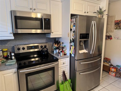 Beautiful and spacious 2BR/2BA condo in the prestigious 55+ on Sunrise Lakes Phase III in Florida - for sale on GolfHomes.com, golf home, golf lot