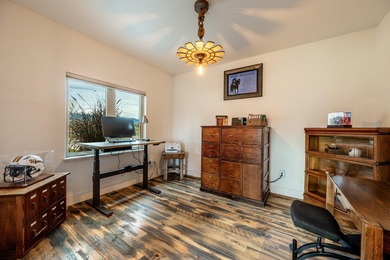 Beautifully upgraded and move-in ready, this two-level paired on The Powder Horn Golf Club - Mountain in Wyoming - for sale on GolfHomes.com, golf home, golf lot