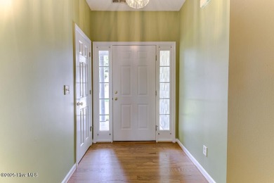 Discover this beautifully maintained 3-bedroom, 2-bathroom home on Belvedere Country Club in North Carolina - for sale on GolfHomes.com, golf home, golf lot