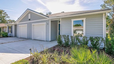 Embrace Flagler County living in the Palm Coast Villas, a on The Grand Club - Pine Lakes Course in Florida - for sale on GolfHomes.com, golf home, golf lot