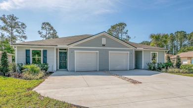 Embrace Flagler County living in the Palm Coast Villas, a on The Grand Club - Pine Lakes Course in Florida - for sale on GolfHomes.com, golf home, golf lot