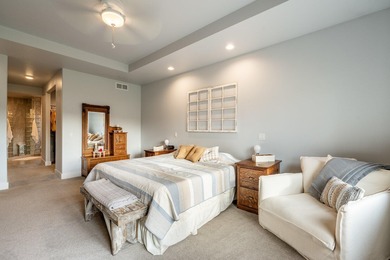 Beautifully upgraded and move-in ready, this two-level paired on The Powder Horn Golf Club - Mountain in Wyoming - for sale on GolfHomes.com, golf home, golf lot