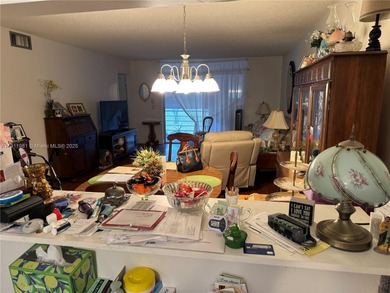 Beautiful and spacious 2BR/2BA condo in the prestigious 55+ on Sunrise Lakes Phase III in Florida - for sale on GolfHomes.com, golf home, golf lot