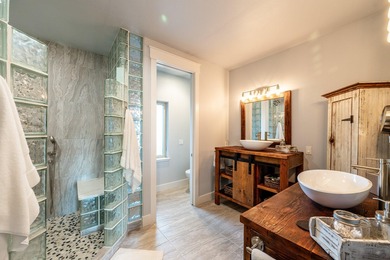 Beautifully upgraded and move-in ready, this two-level paired on The Powder Horn Golf Club - Mountain in Wyoming - for sale on GolfHomes.com, golf home, golf lot