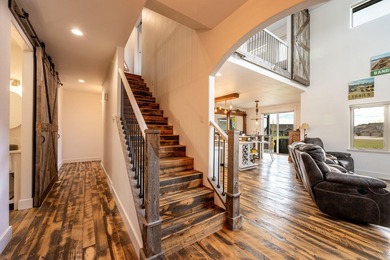 Beautifully upgraded and move-in ready, this two-level paired on The Powder Horn Golf Club - Mountain in Wyoming - for sale on GolfHomes.com, golf home, golf lot