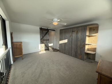 Beautifully upgraded and move-in ready, this two-level paired on The Powder Horn Golf Club - Mountain in Wyoming - for sale on GolfHomes.com, golf home, golf lot