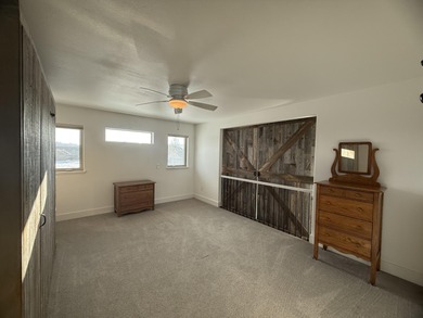 Beautifully upgraded and move-in ready, this two-level paired on The Powder Horn Golf Club - Mountain in Wyoming - for sale on GolfHomes.com, golf home, golf lot