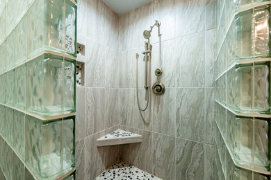 Beautifully upgraded and move-in ready, this two-level paired on The Powder Horn Golf Club - Mountain in Wyoming - for sale on GolfHomes.com, golf home, golf lot