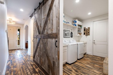 Beautifully upgraded and move-in ready, this two-level paired on The Powder Horn Golf Club - Mountain in Wyoming - for sale on GolfHomes.com, golf home, golf lot