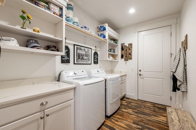 Beautifully upgraded and move-in ready, this two-level paired on The Powder Horn Golf Club - Mountain in Wyoming - for sale on GolfHomes.com, golf home, golf lot