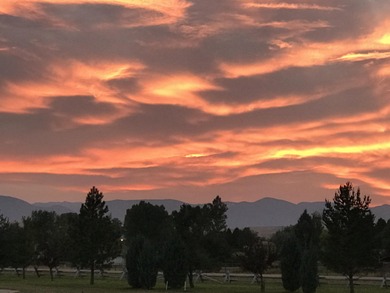 Beautifully upgraded and move-in ready, this two-level paired on The Powder Horn Golf Club - Mountain in Wyoming - for sale on GolfHomes.com, golf home, golf lot