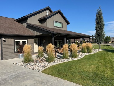 Beautifully upgraded and move-in ready, this two-level paired on The Powder Horn Golf Club - Mountain in Wyoming - for sale on GolfHomes.com, golf home, golf lot