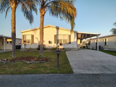 Welcome to this 3-bedroom 2-bath oasis!!! Lot Rent includes all on Spanish Lakes Fairways in Florida - for sale on GolfHomes.com, golf home, golf lot