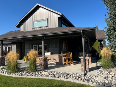 Beautifully upgraded and move-in ready, this two-level paired on The Powder Horn Golf Club - Mountain in Wyoming - for sale on GolfHomes.com, golf home, golf lot