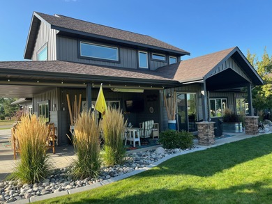 Beautifully upgraded and move-in ready, this two-level paired on The Powder Horn Golf Club - Mountain in Wyoming - for sale on GolfHomes.com, golf home, golf lot