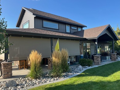 Beautifully upgraded and move-in ready, this two-level paired on The Powder Horn Golf Club - Mountain in Wyoming - for sale on GolfHomes.com, golf home, golf lot